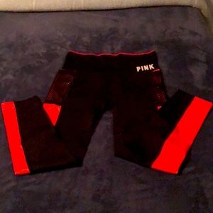 Pink Victoria’s Secret leggings. Black w/coral details mesh pockets NWOT Size S